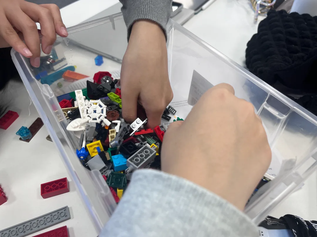 LEGO pieces in a tub.