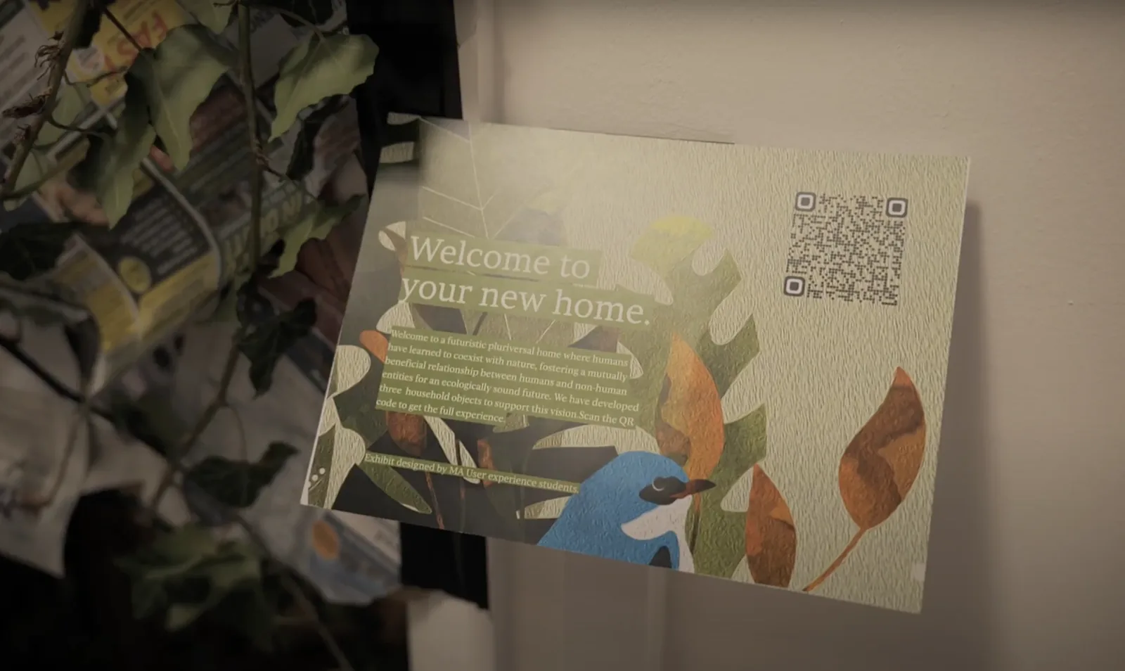 The printed invitation card with a QR code to the promotional video.